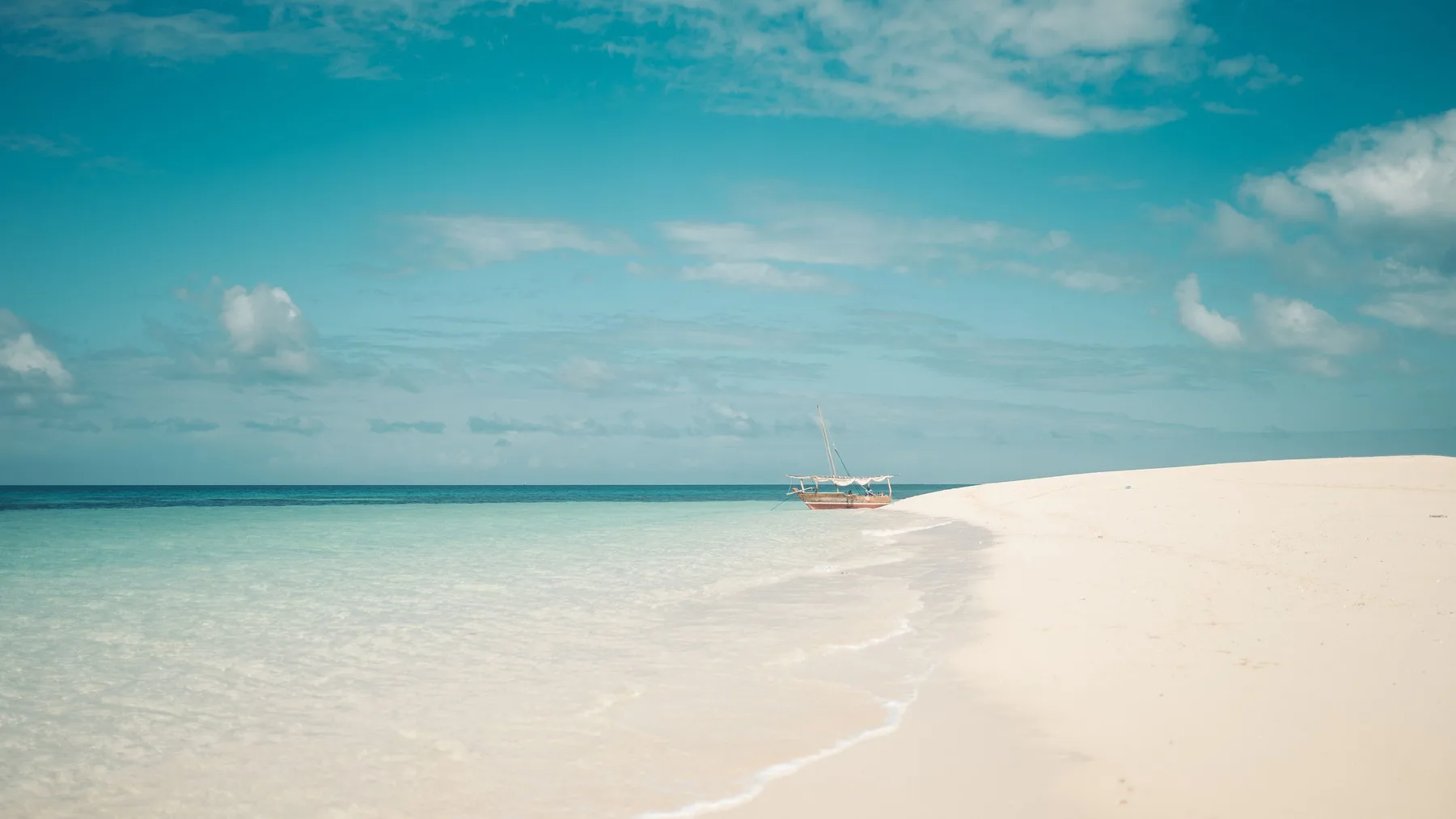 White-sand beach and turquoise water in Mozambique