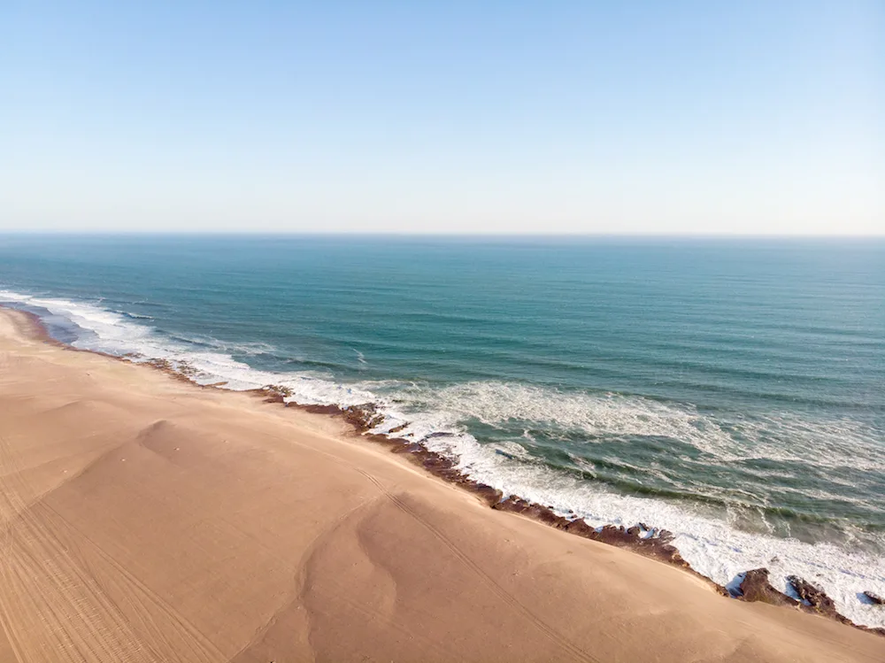 Namibian coastline meeting the Atlantic Ocean
