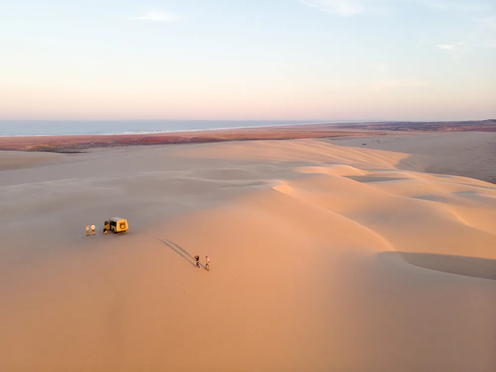 Hot-air balloon over Namibian desert dunes