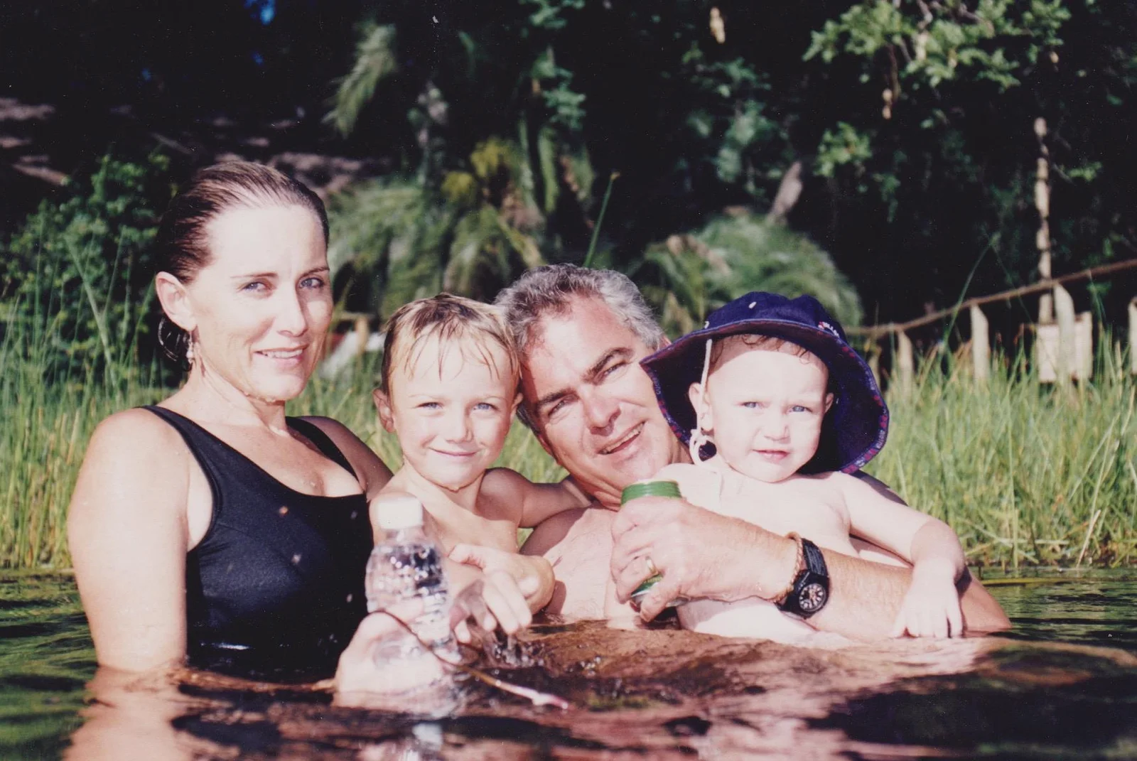 Jake with his family in the water