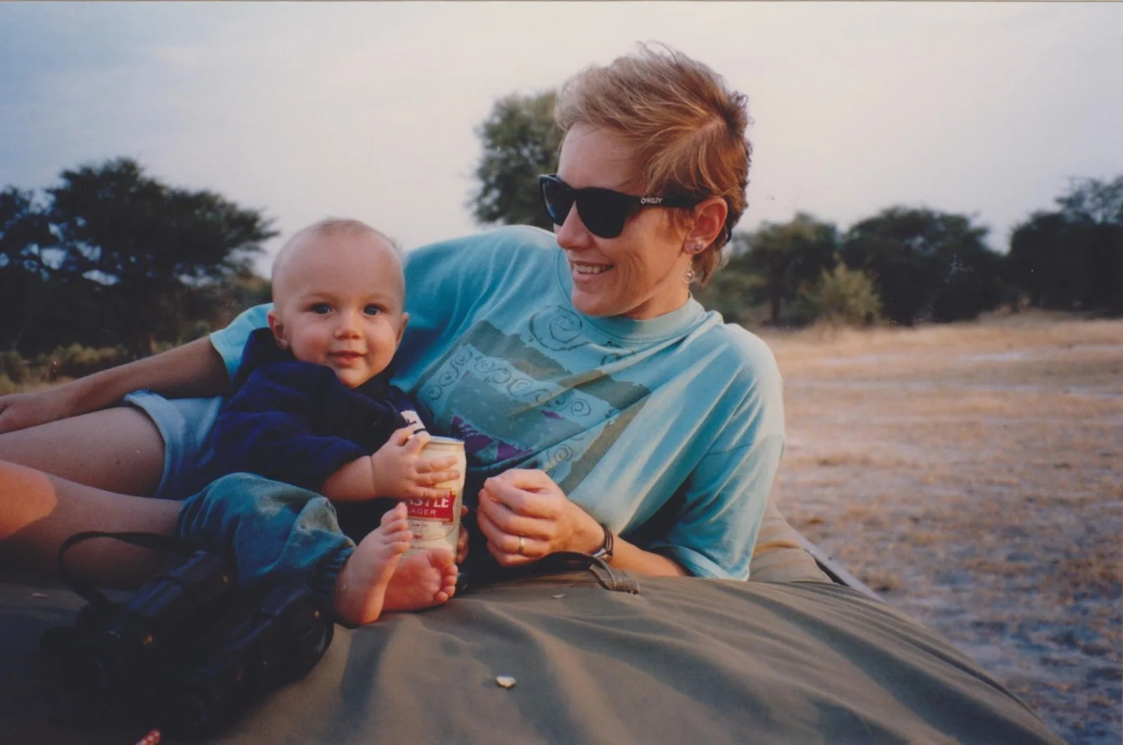 Jake as a baby with his father in the bush